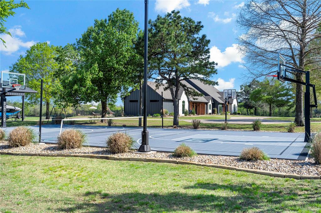 5000 Stillhouse Road Paris, TX 75460 - Photo 5 of 40 a view of a house with swimming pool and sitting area