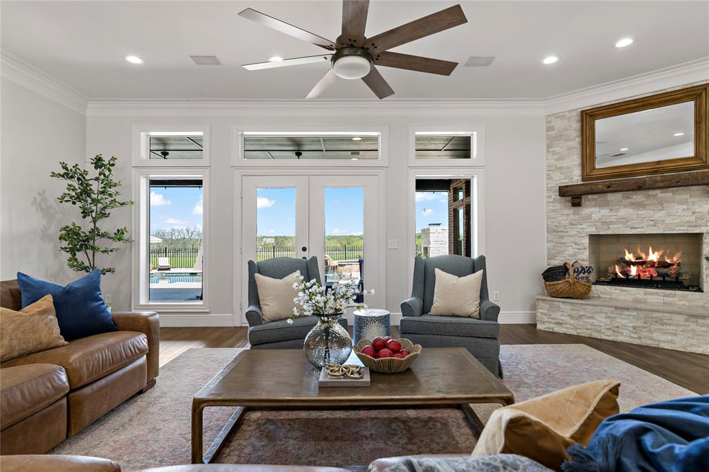 5000 Stillhouse Road Paris, TX 75460 - Photo 6 of 40 a living room with furniture kitchen view and a fireplace