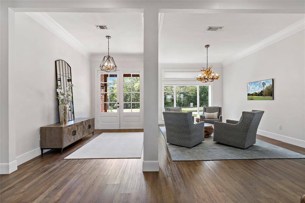 5000 Stillhouse Road Paris, TX 75460 - Photo 9 of 40 a living room with furniture and wooden floor