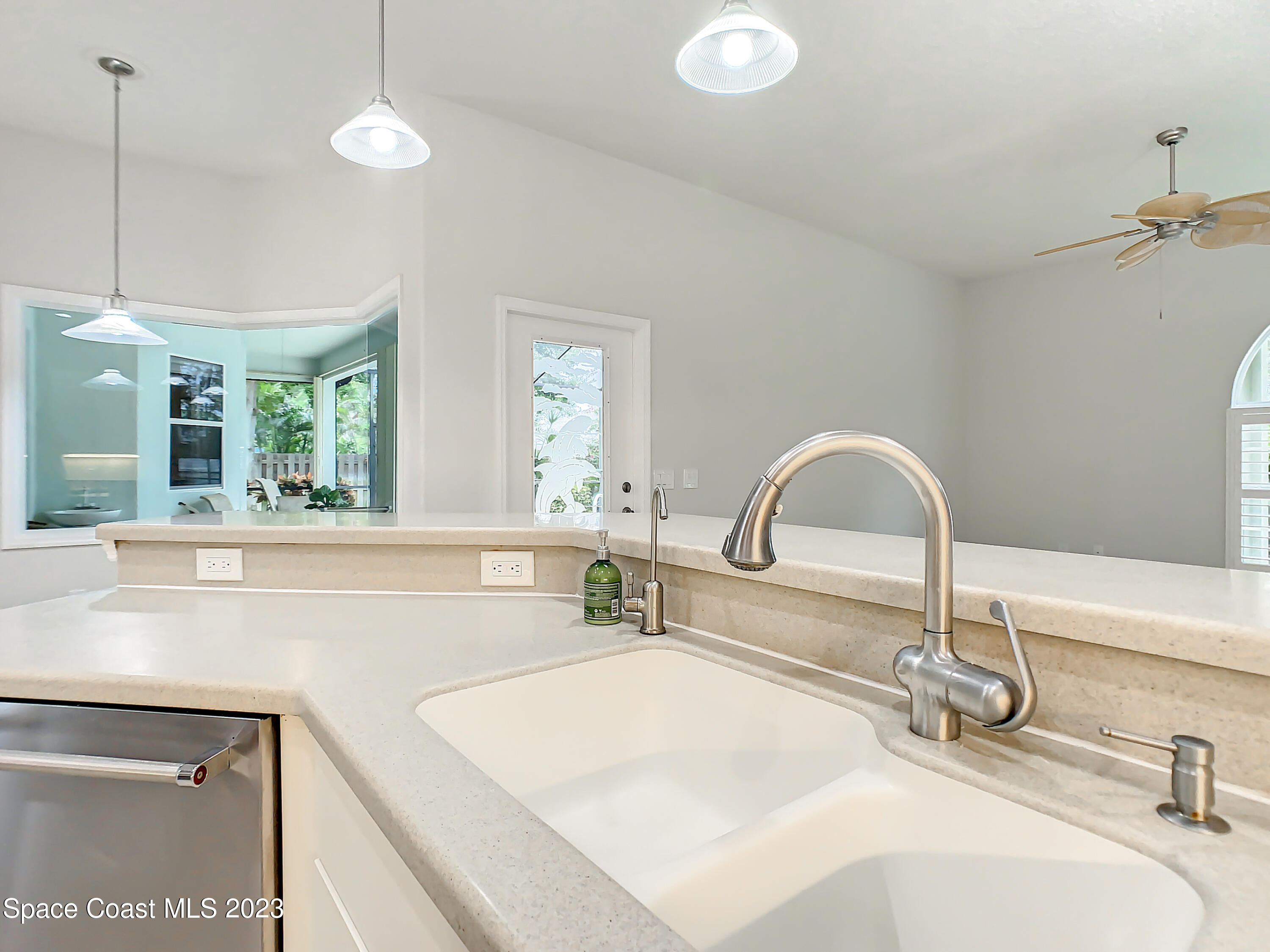 1965 Gates Road Merritt Island, FL 32952 - Photo 13 of 54 a bathroom with a sink and a window