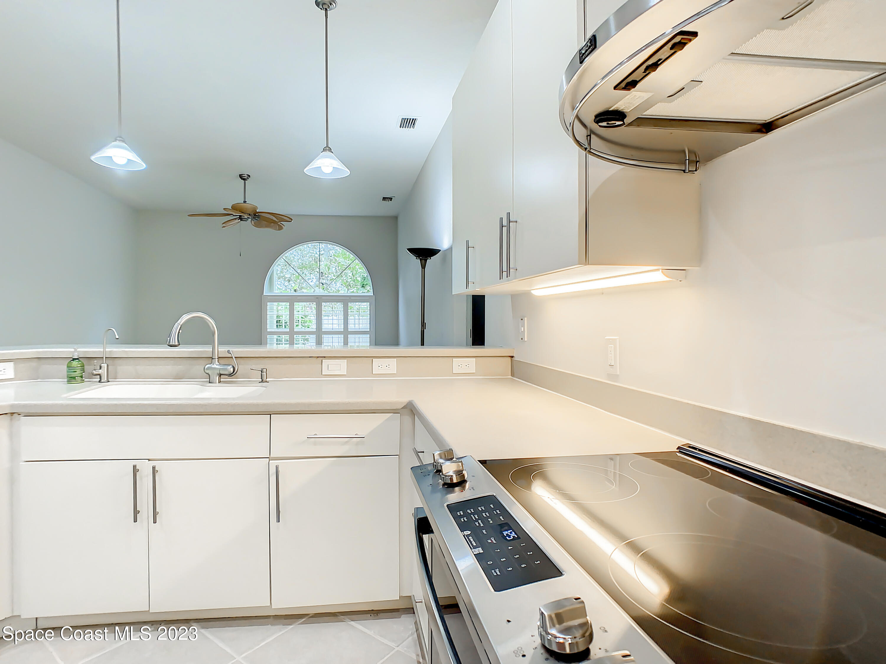 1965 Gates Road Merritt Island, FL 32952 - Photo 14 of 54 a bathroom with a sink and a mirror