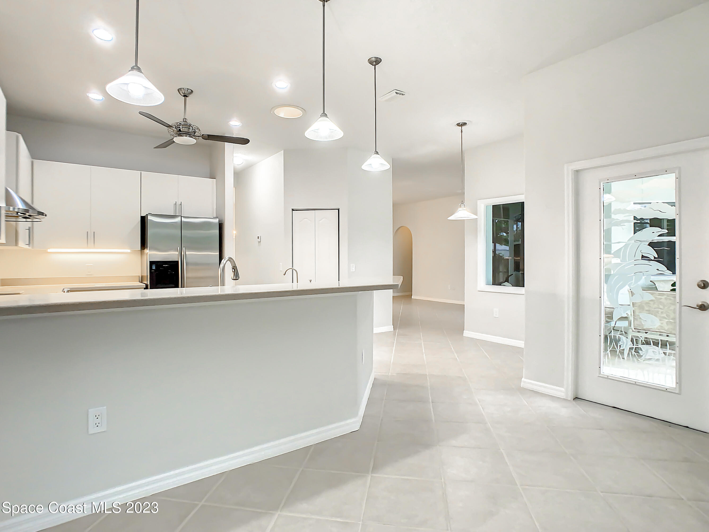 1965 Gates Road Merritt Island, FL 32952 - Photo 17 of 54 a view of a kitchen with a sink and window