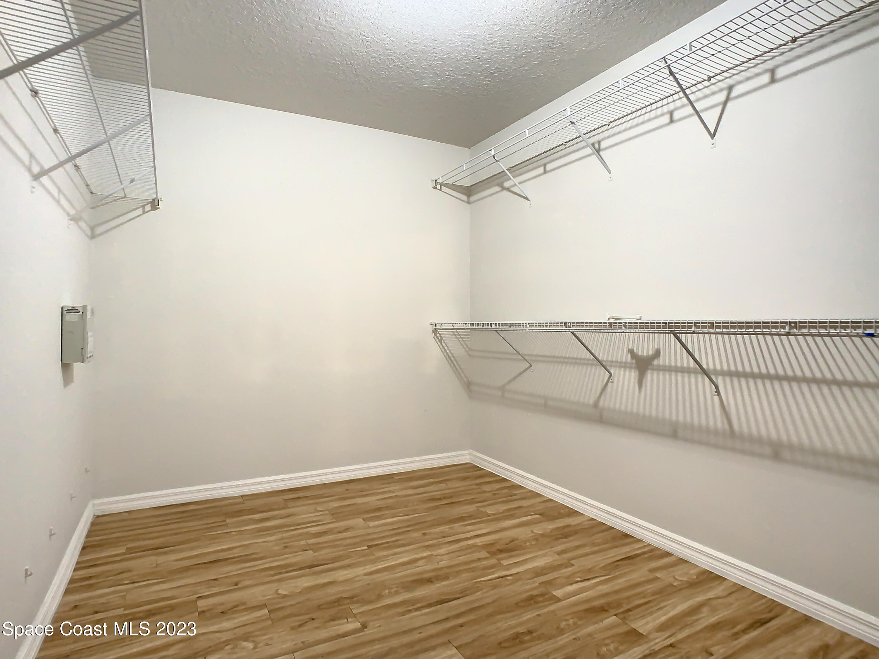 1965 Gates Road Merritt Island, FL 32952 - Photo 29 of 54 a view of a room with racks on the wall