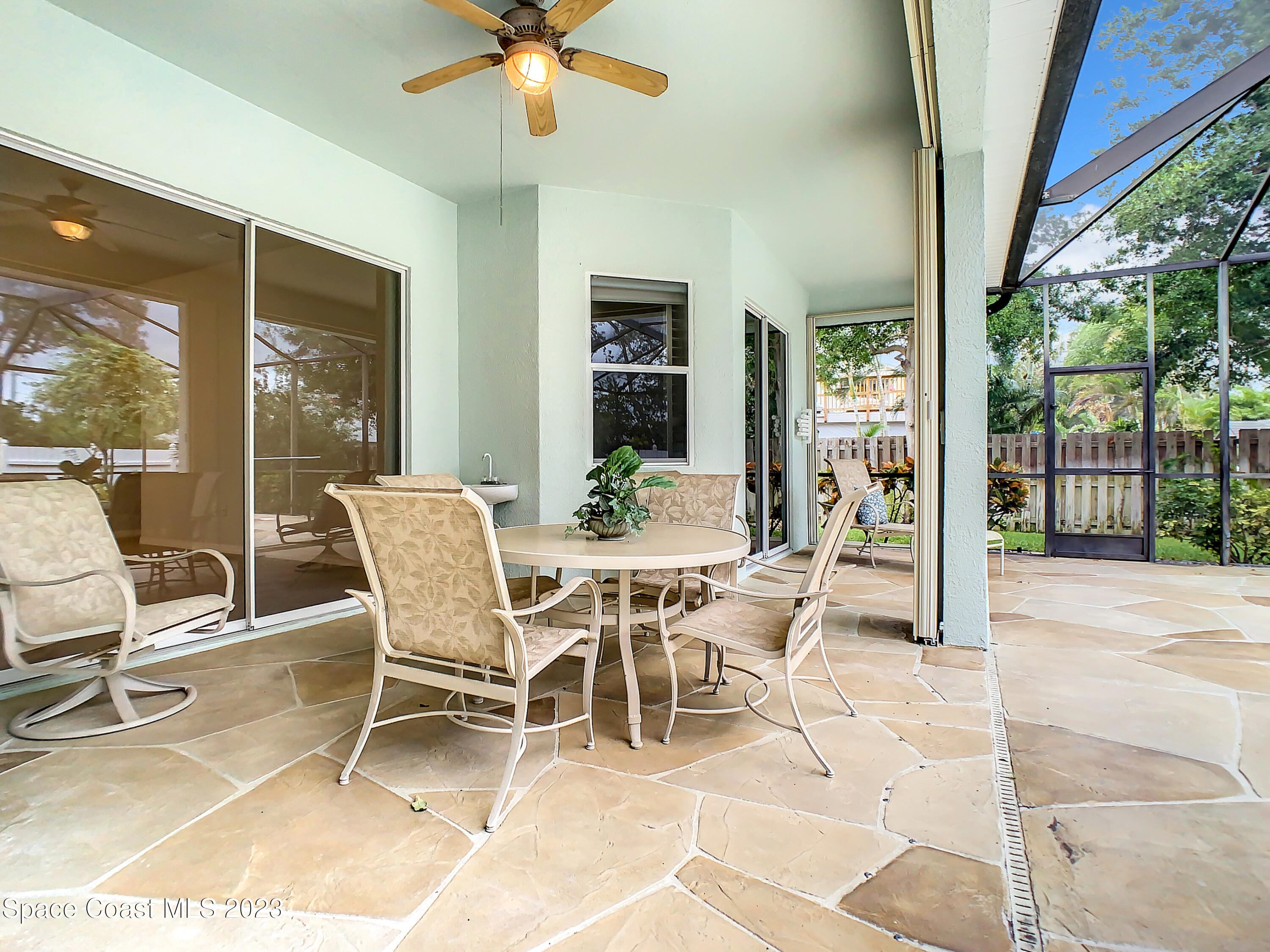 1965 Gates Road Merritt Island, FL 32952 - Photo 35 of 54 a view of a dining room with furniture window and outside view