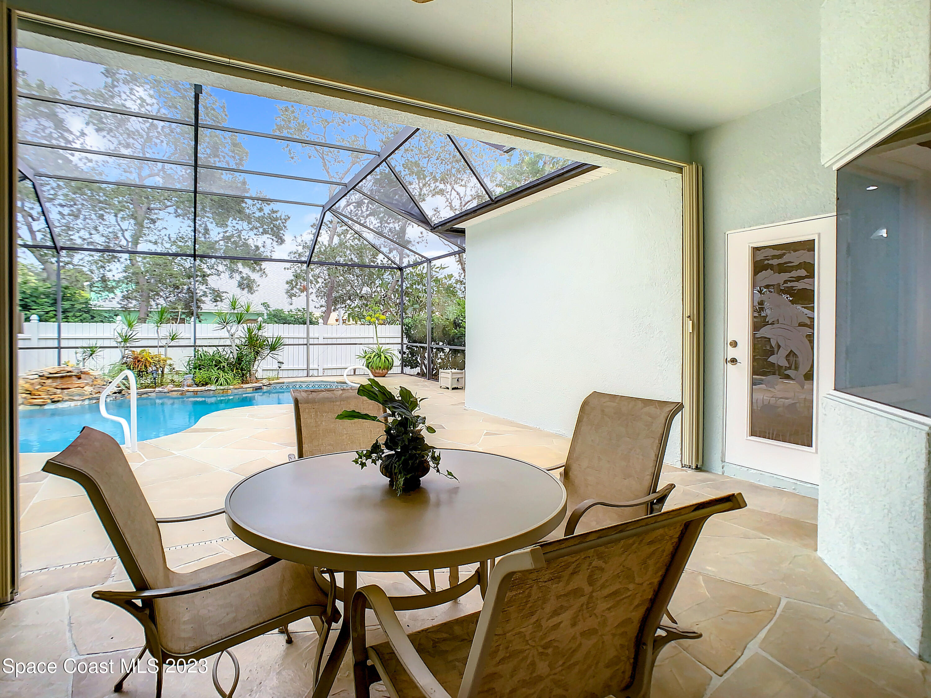1965 Gates Road Merritt Island, FL 32952 - Photo 37 of 54 a view of a dining room with furniture window and outside view