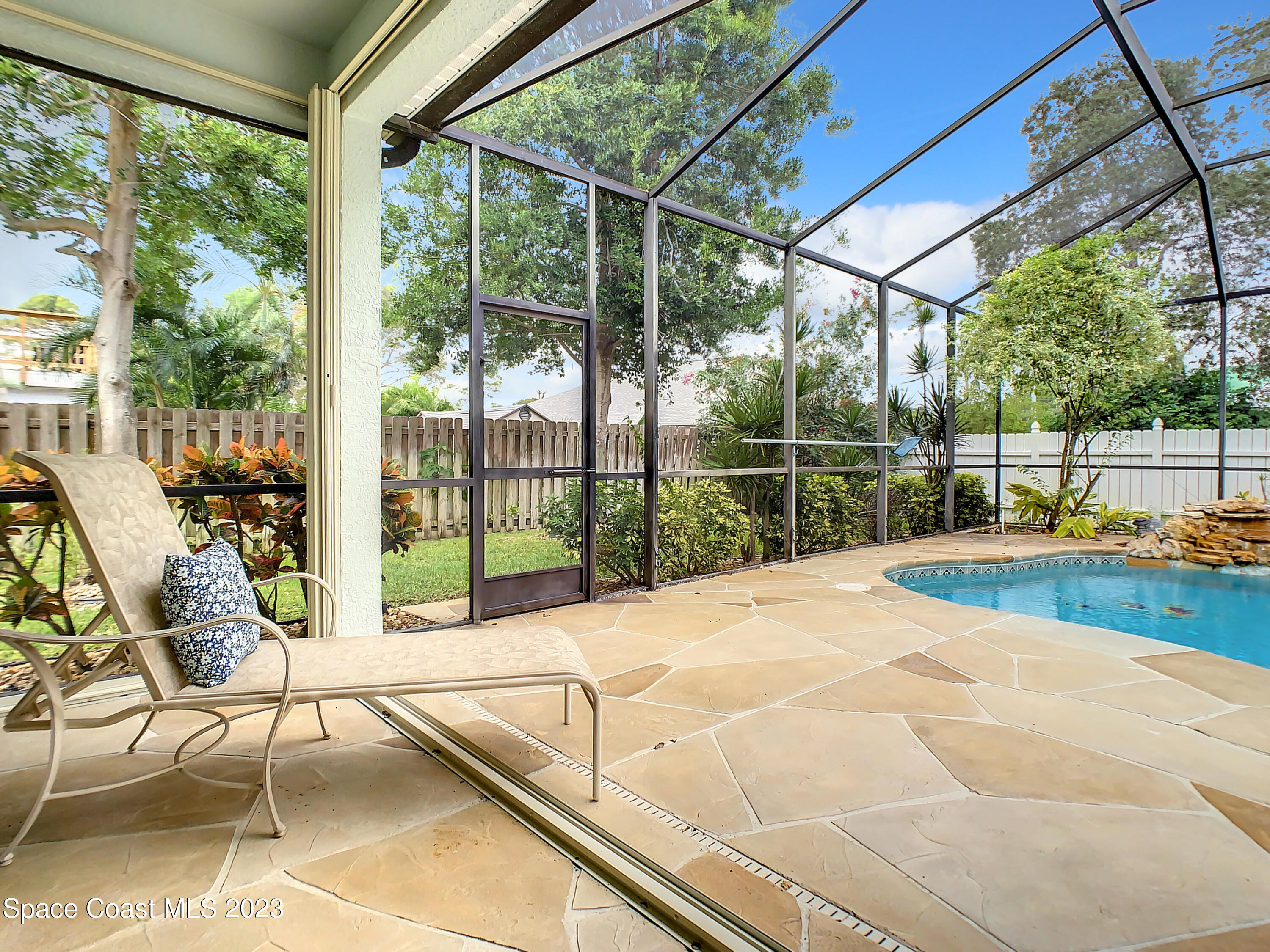 1965 Gates Road Merritt Island, FL 32952 - Photo 38 of 54 a view of swimming pool with outdoor seating and yard