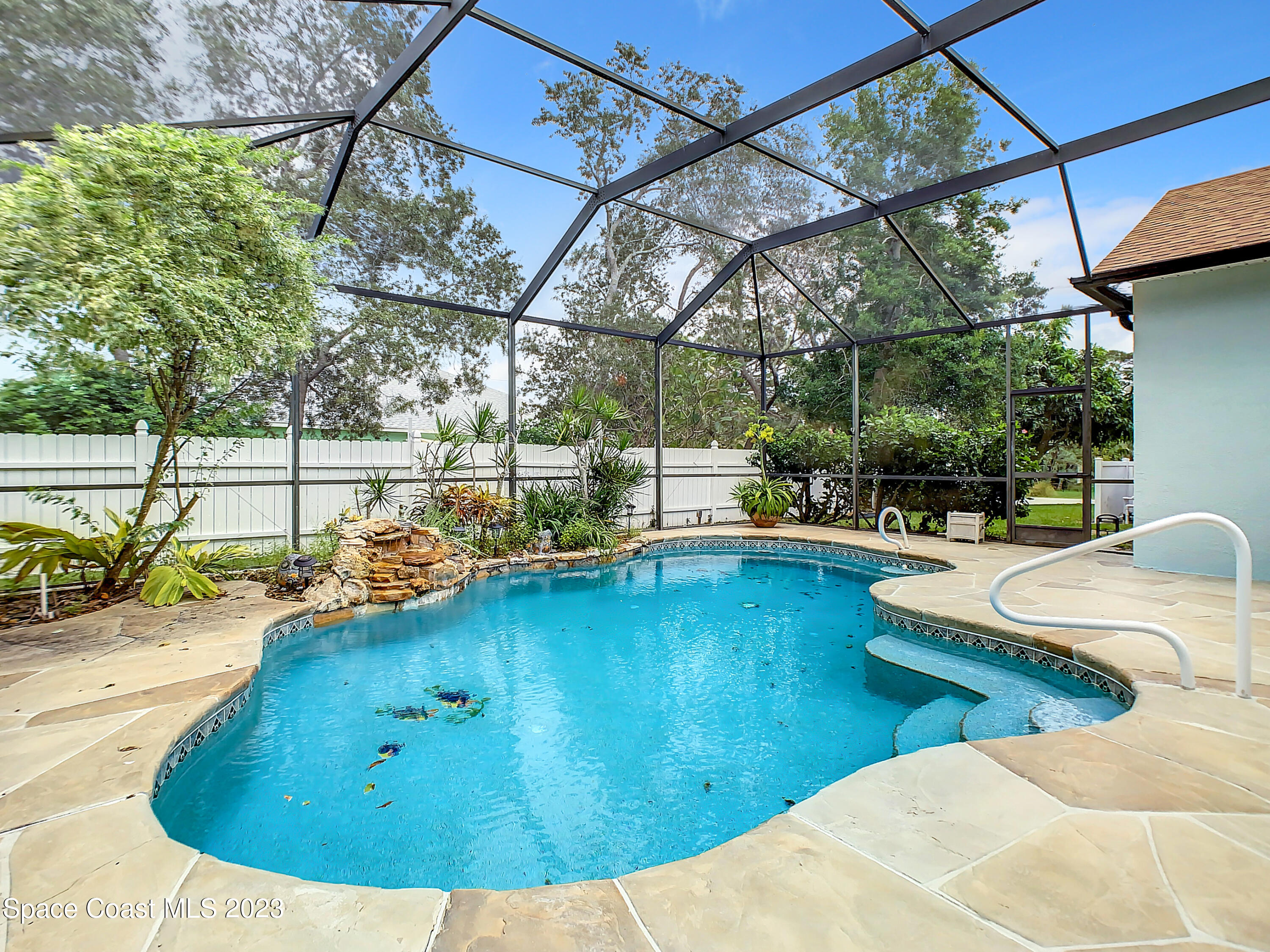 1965 Gates Road Merritt Island, FL 32952 - Photo 40 of 54 a view of a swimming pool with a patio