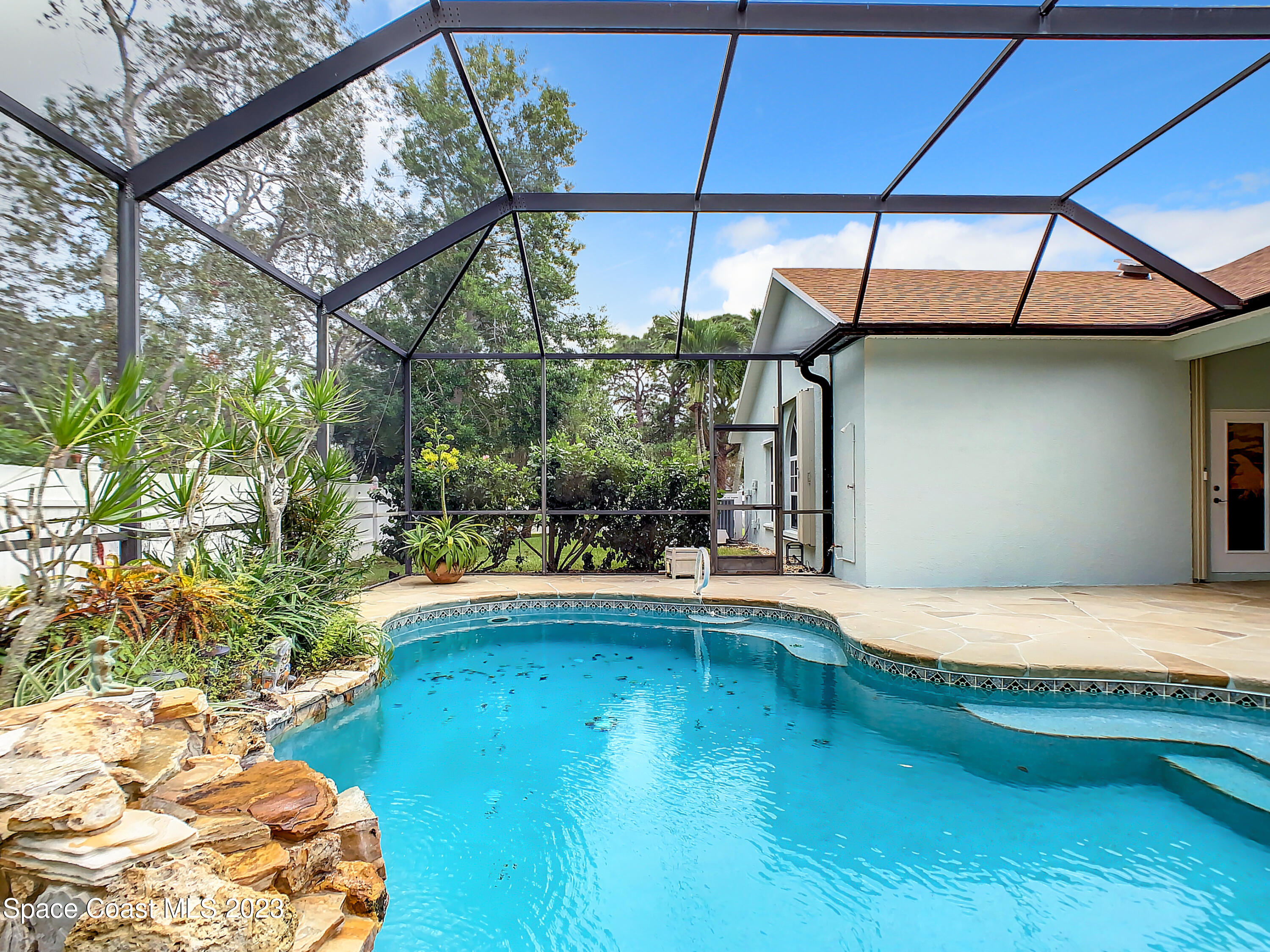 1965 Gates Road Merritt Island, FL 32952 - Photo 42 of 54 a view of outdoor space and swimming pool
