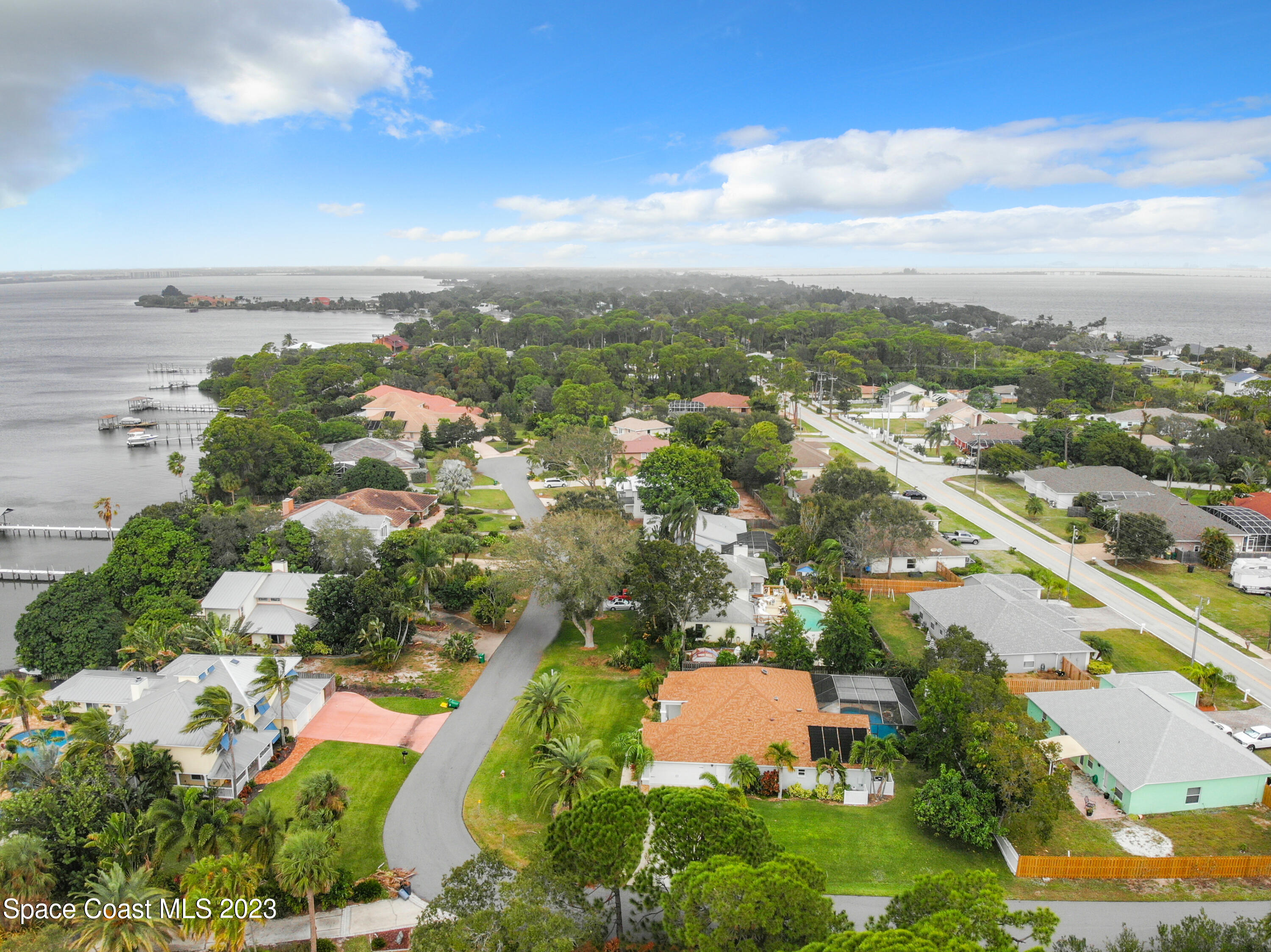 1965 Gates Road Merritt Island, FL 32952 - Photo 48 of 54 an aerial view of residential houses with outdoor space