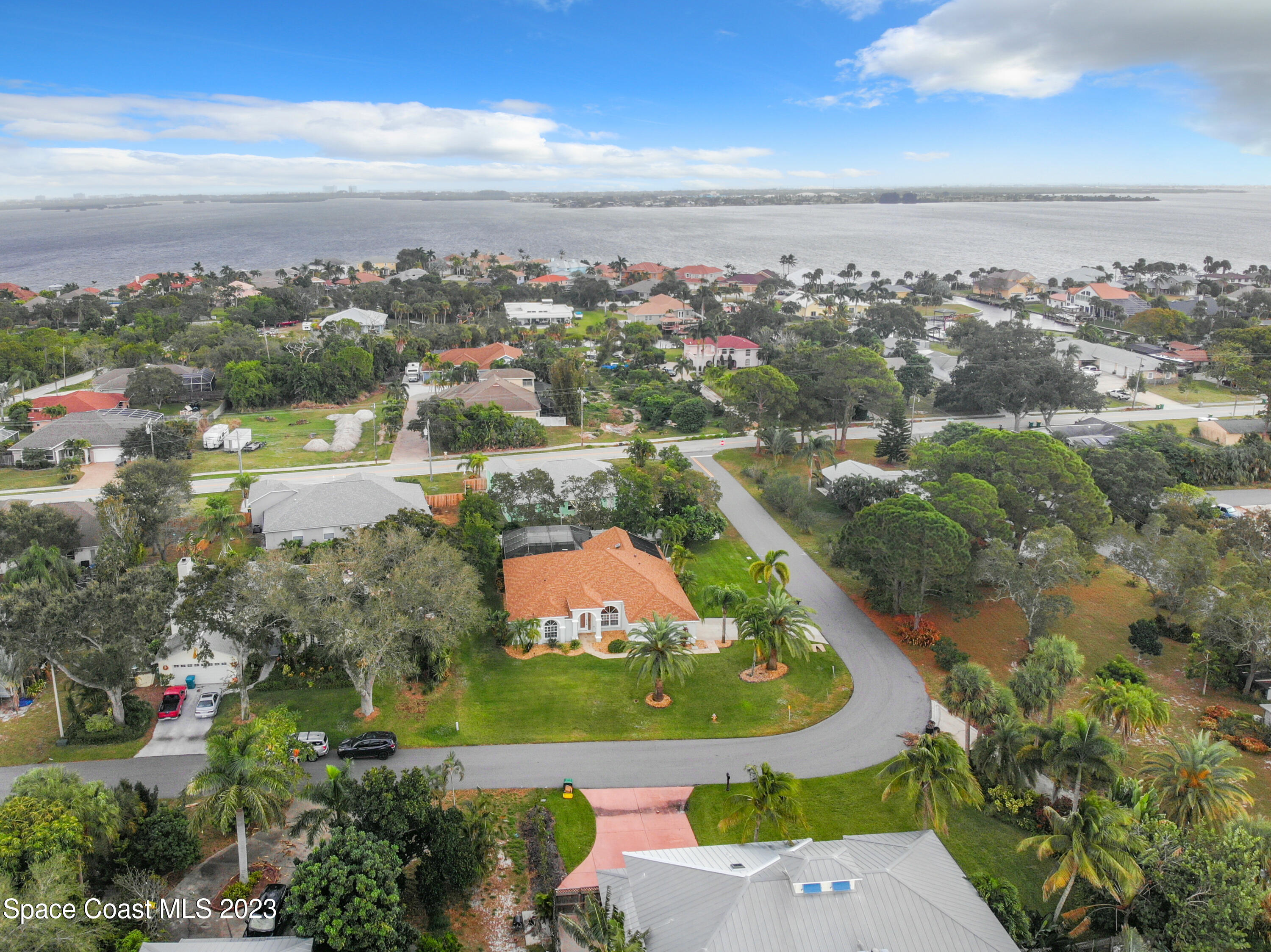 1965 Gates Road Merritt Island, FL 32952 - Photo 49 of 54 an aerial view of residential houses with outdoor space