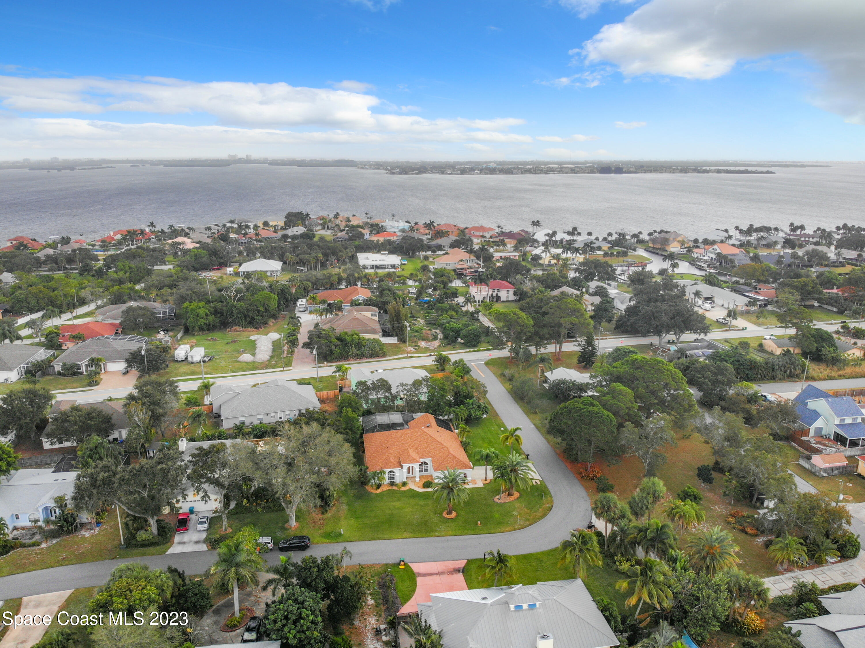 1965 Gates Road Merritt Island, FL 32952 - Photo 52 of 54 an aerial view of residential houses with outdoor space