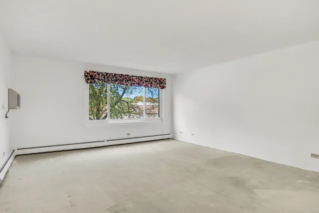 $215,000 | 1107 South Old Wilke Road, Unit 201, Rolling Meadows, IL 60005