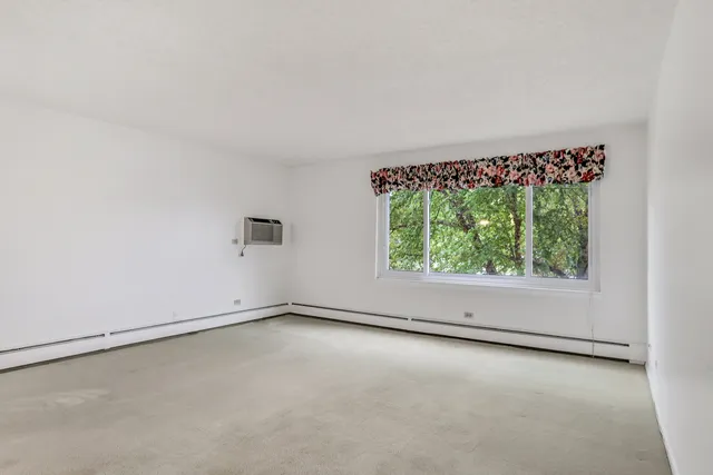 $215,000 | 1107 South Old Wilke Road, Unit 201, Rolling Meadows, IL 60005