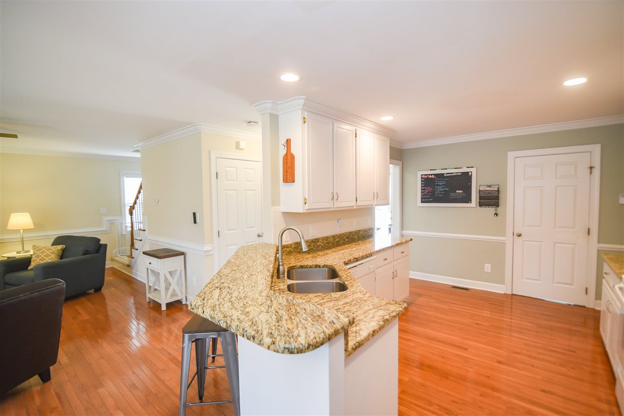 9200 Dawnshire Road Raleigh, NC 27615 - Photo 11 of 30 Glistening hardwood floors flow throughout the first floor living areas. Recently updated in 2015. Kitchen