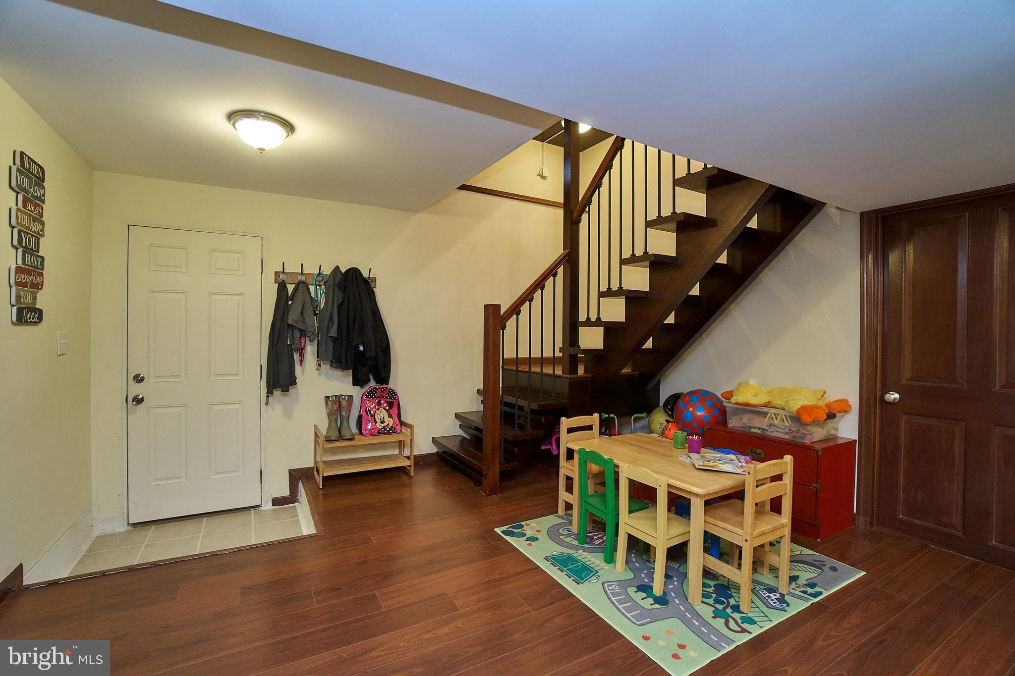 7300 Oriole Avenue Springfield, VA 22150 - Photo 23 of 31 lower level staircase, door to back yard