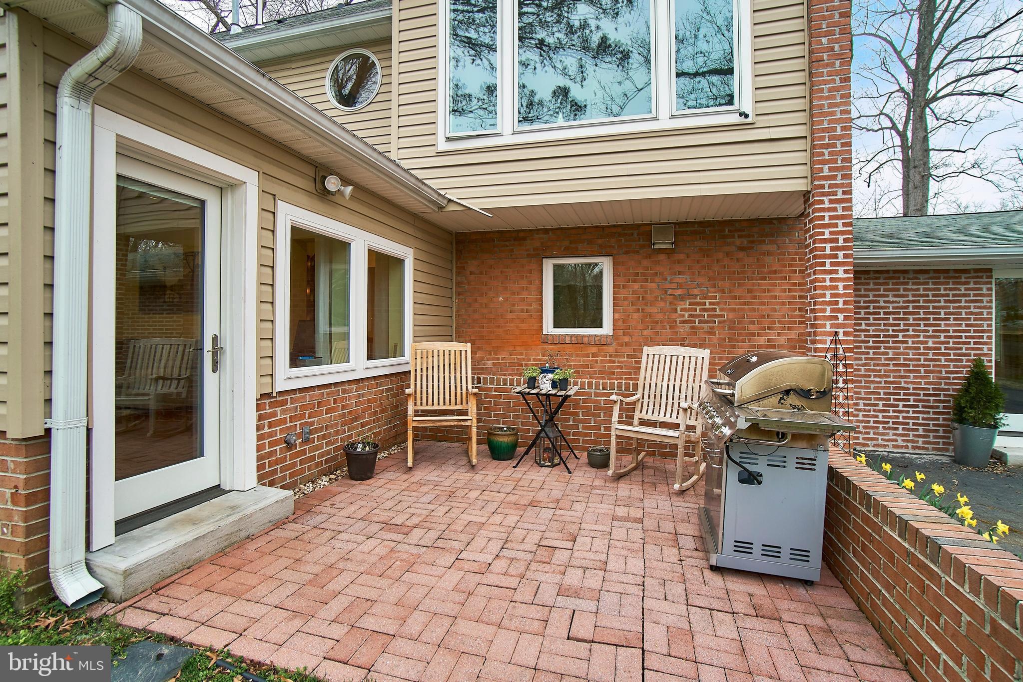 7300 Oriole Avenue Springfield, VA 22150 - Photo 27 of 31 Brick patio off family room