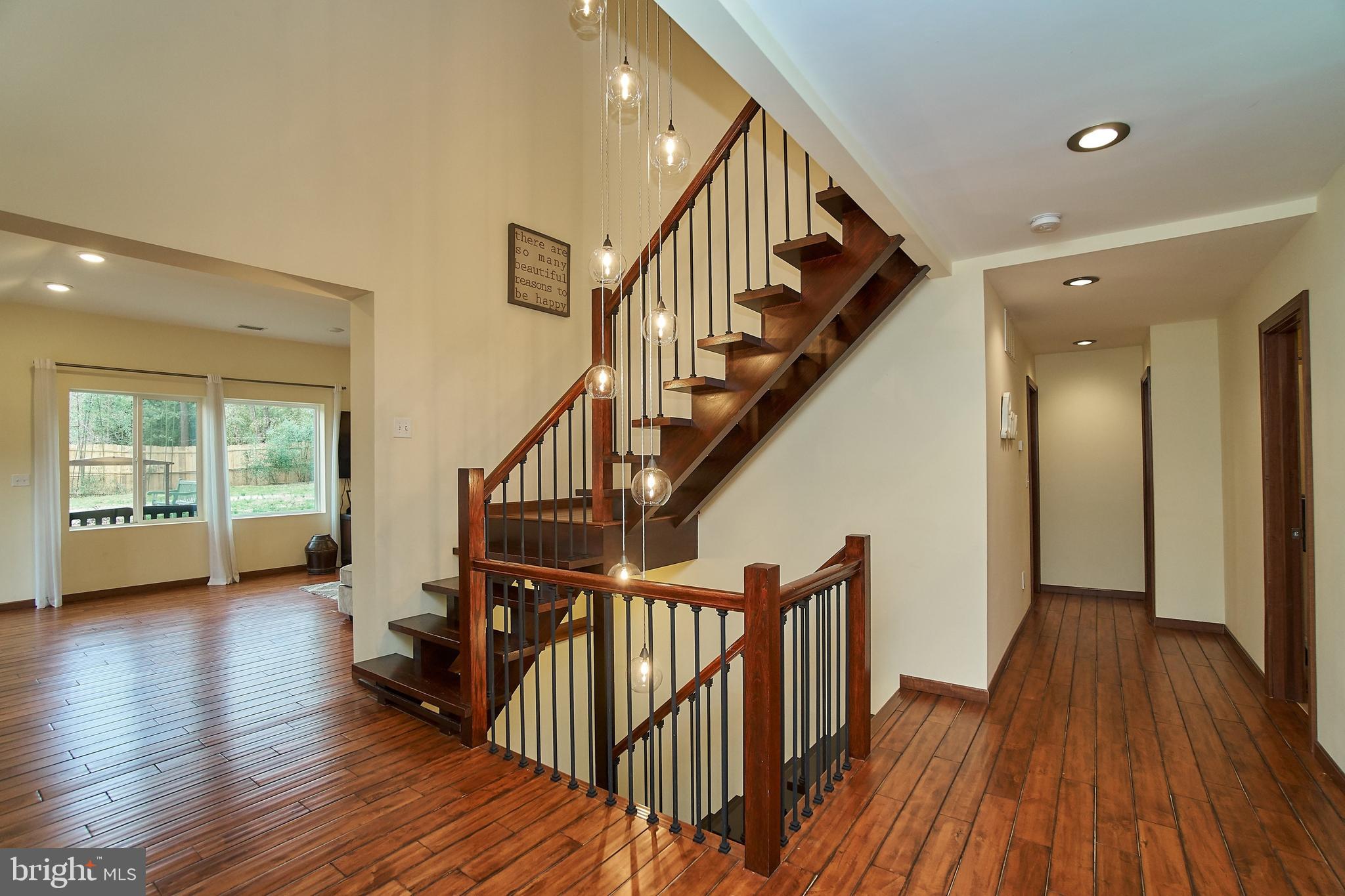7300 Oriole Avenue Springfield, VA 22150 - Photo 7 of 31 Dramatic hallway lighting spans 3 levels