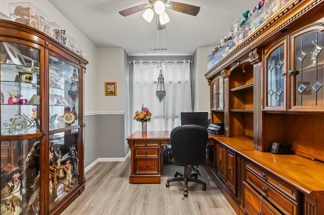 a view of a workspace with furniture and workspace