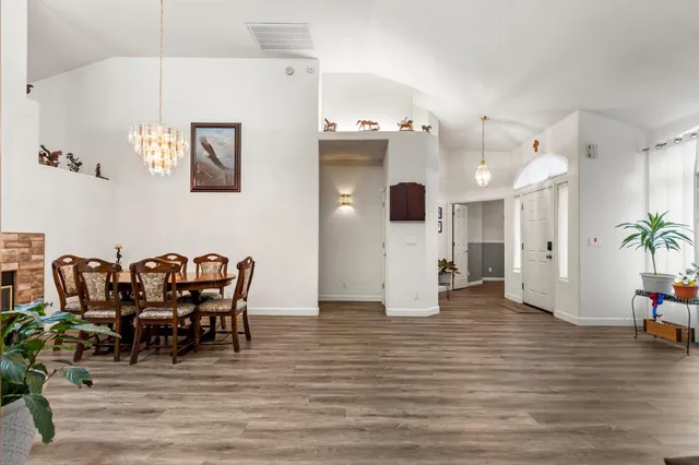 a view of a livingroom with furniture and lounge chair