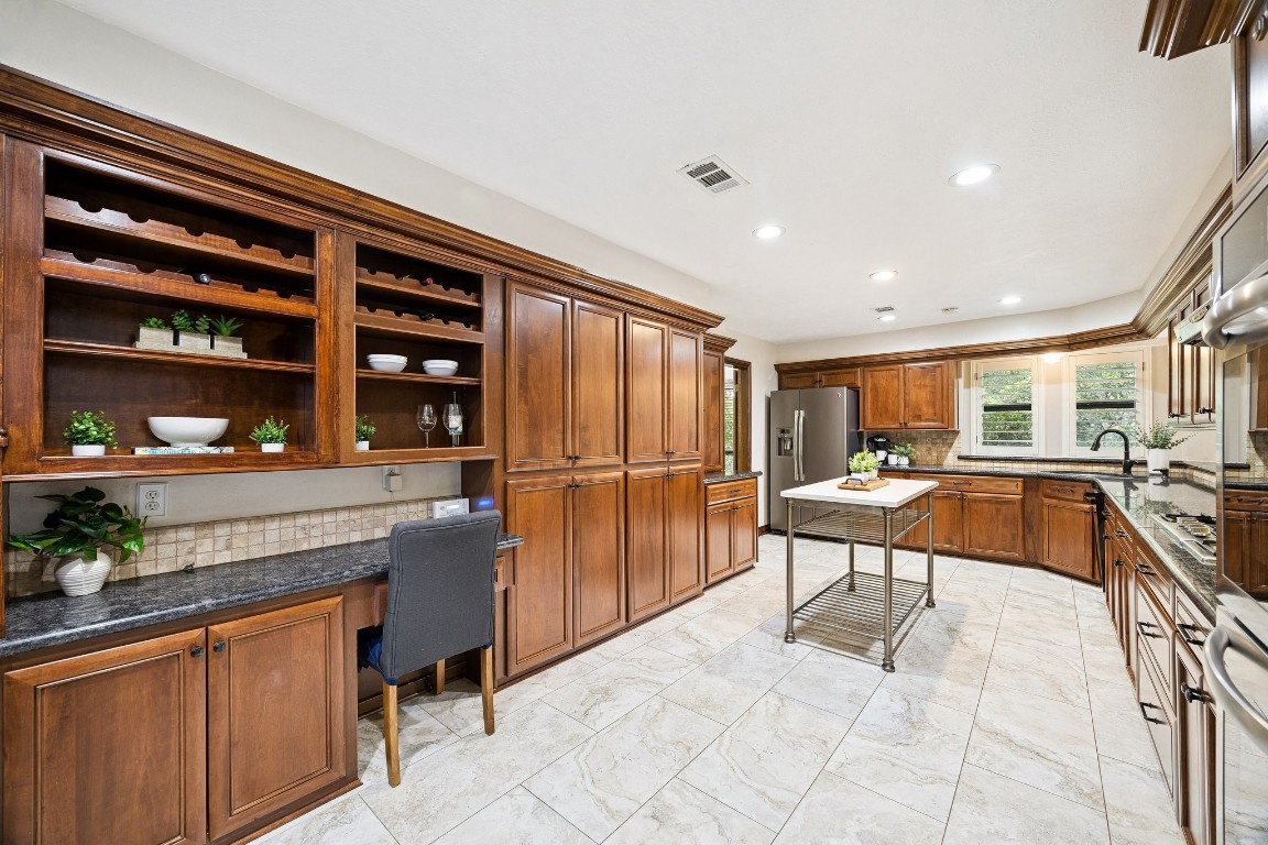 2 Chatterbird Spring, TX 77380 - Photo 12 of 40 A place for everything and a pantry wall to hide it all in. Fridge included.