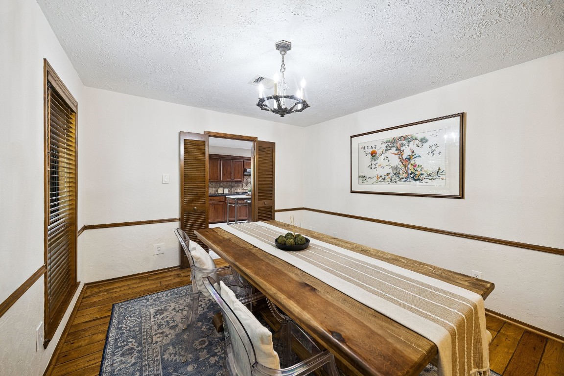 2 Chatterbird Spring, TX 77380 - Photo 17 of 40 Heading through the dining room and into the kitchen.