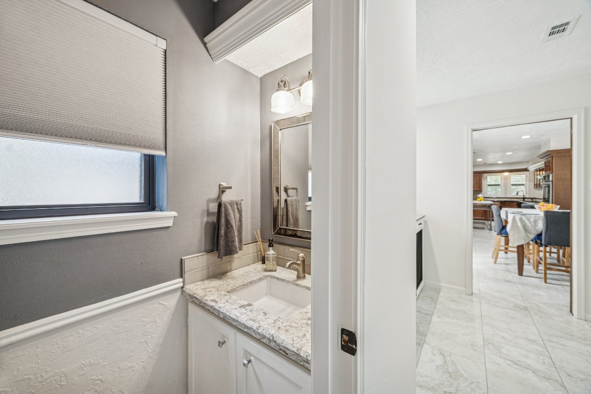 2 Chatterbird Spring, TX 77380 - Photo 35 of 40 Powder room perfectly situated for near the pool.