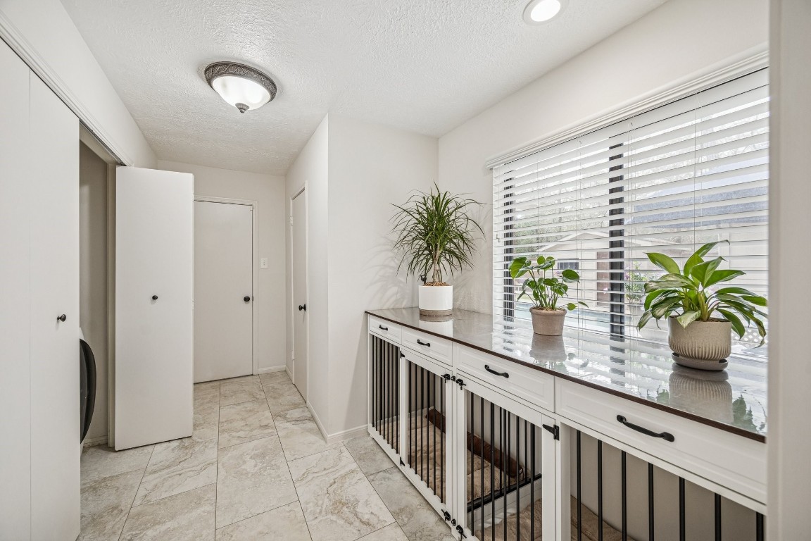 2 Chatterbird Spring, TX 77380 - Photo 36 of 40 a kitchen with stainless steel appliances a sink and cabinets