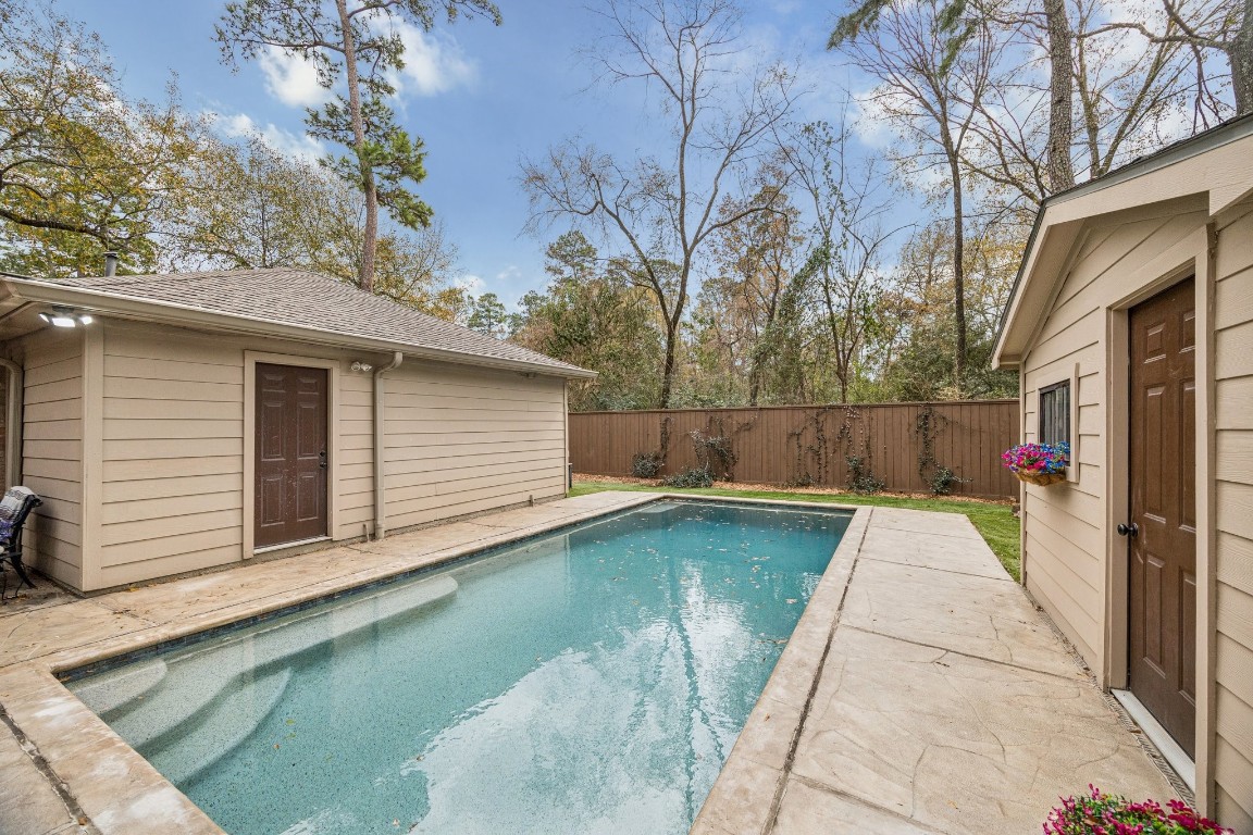 2 Chatterbird Spring, TX 77380 - Photo 6 of 40 A private backyard with an inground pool.
