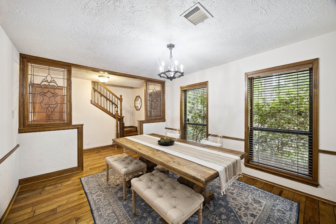 2 Chatterbird Spring, TX 77380 - Photo 7 of 40 Formal Dining Room with windows looking out to the front of the home. Beautiful custom decorative glass.