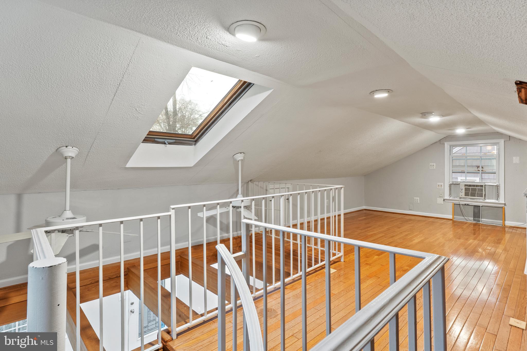 75 Silopanna Road Annapolis, MD 21403 - Photo 7 of 33 a view of staircase and white wooden floor