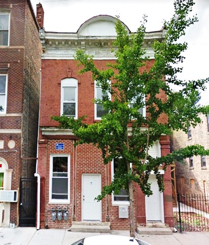 1812 South Throop Street Chicago, IL 60608 - Photo 1 of 1 a front view of a building with a garden