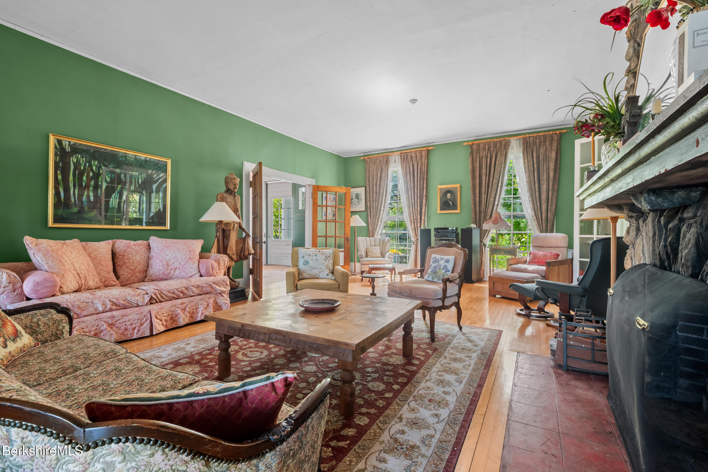 535 Main Road Monterey, MA 01245 - Photo 12 of 45 a living room with furniture fireplace and a large window
