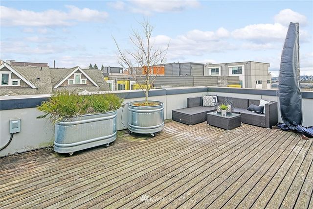 a view of roof deck with patio