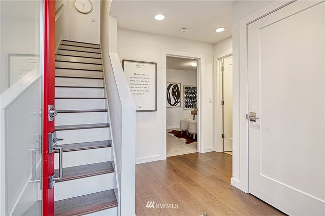 a view of entryway with wooden floor