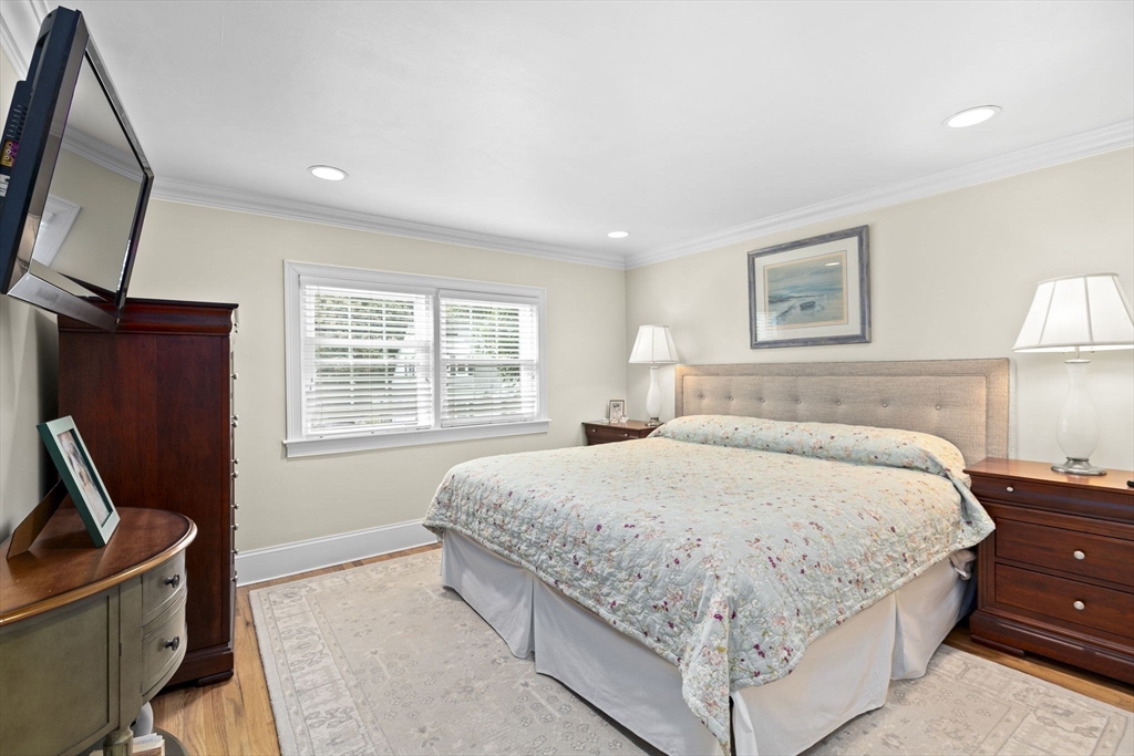 166 Phipps Street Quincy, MA 02169 - Photo 12 of 21 a bedroom with a large bed and a window
