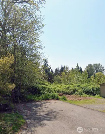 a view of a road with an outdoor space