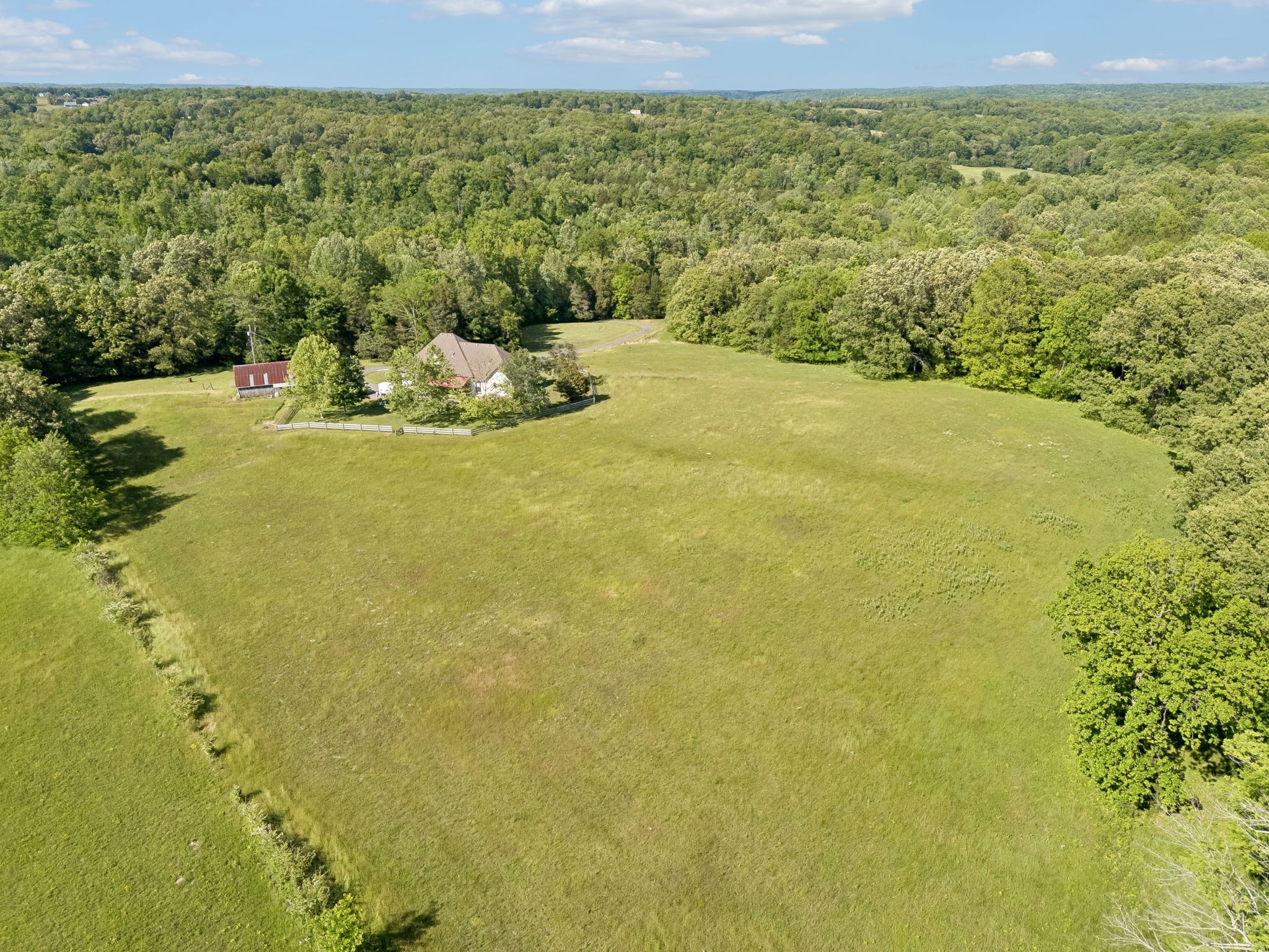 250 Home Pl Road Dickson, TN 37055 - Photo 8 of 62 a view of a lake from a yard