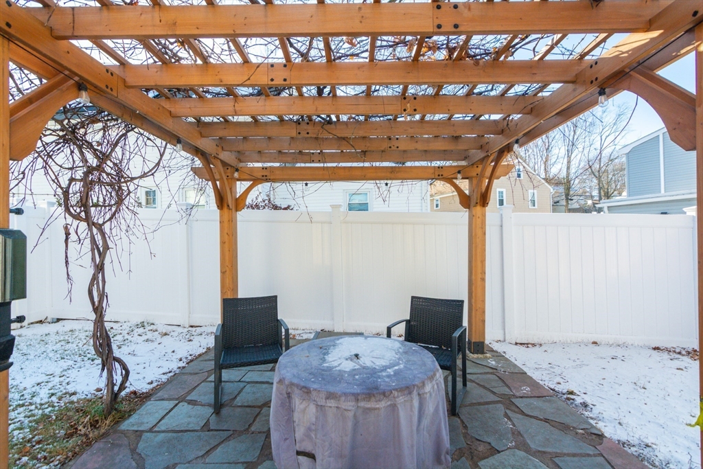 38 Colonial Drive Dedham, MA 02026 - Photo 22 of 28 a view of porch with seating space