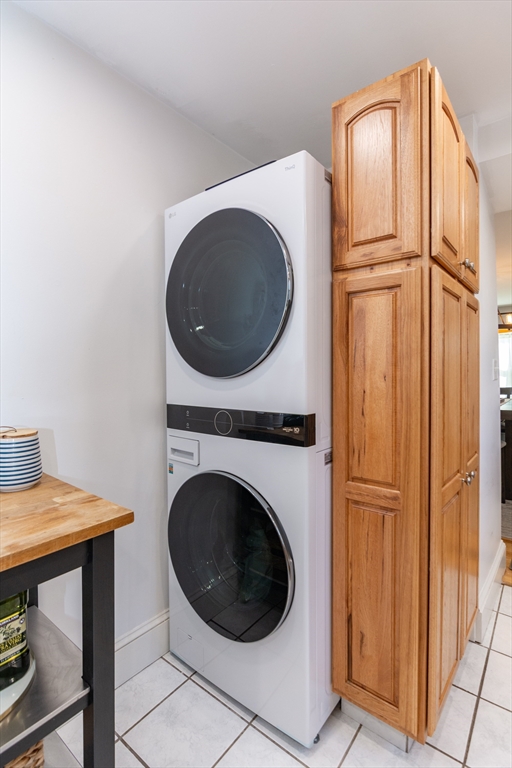 38 Colonial Drive Dedham, MA 02026 - Photo 10 of 28 a utility room with dryer and washer