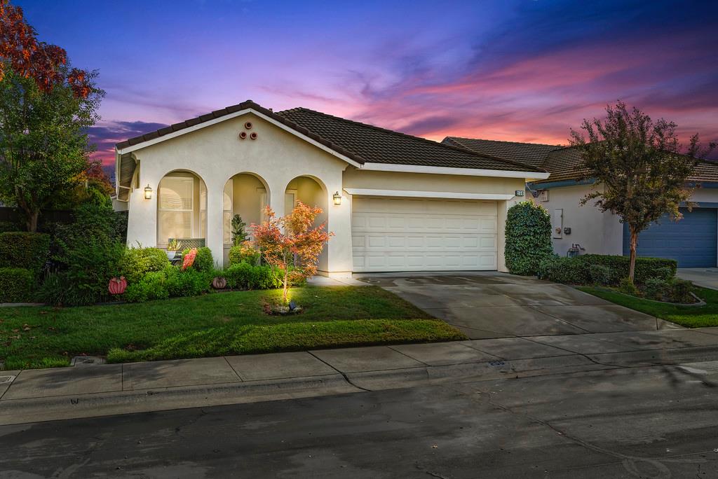 250 Pelican Bay Circle Sacramento, CA 95835 - Photo 1 of 71 a front view of a house with a yard and garage