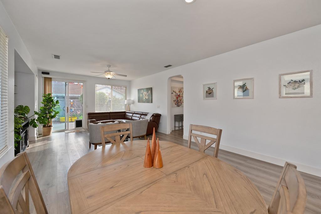 250 Pelican Bay Circle Sacramento, CA 95835 - Photo 25 of 71 a dining room with furniture and wooden floor