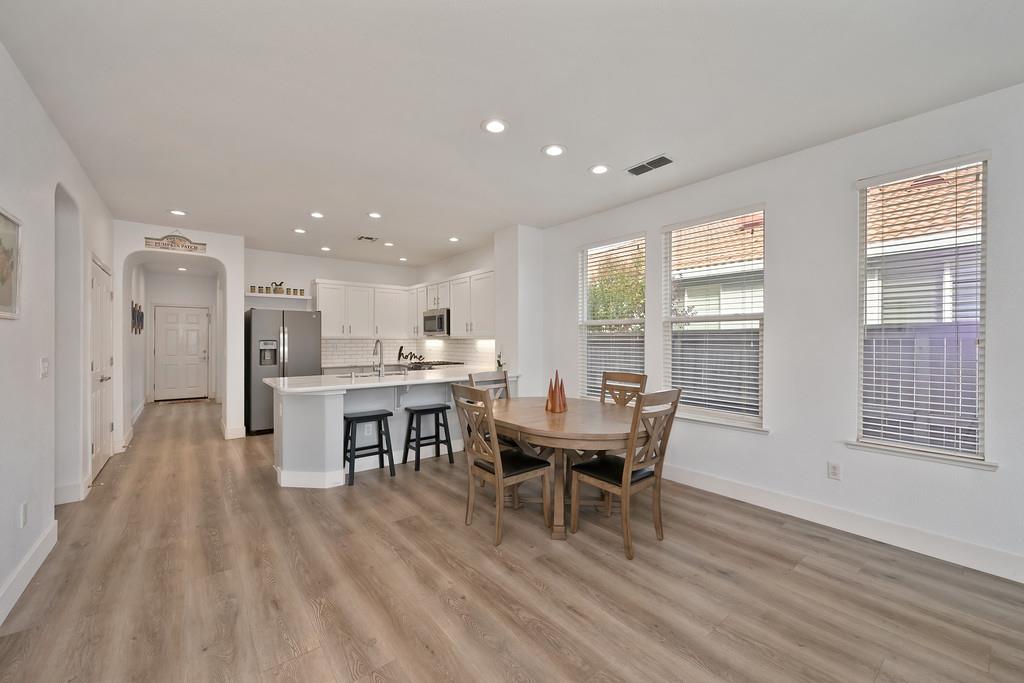 250 Pelican Bay Circle Sacramento, CA 95835 - Photo 26 of 71 a dining room with furniture and wooden floor
