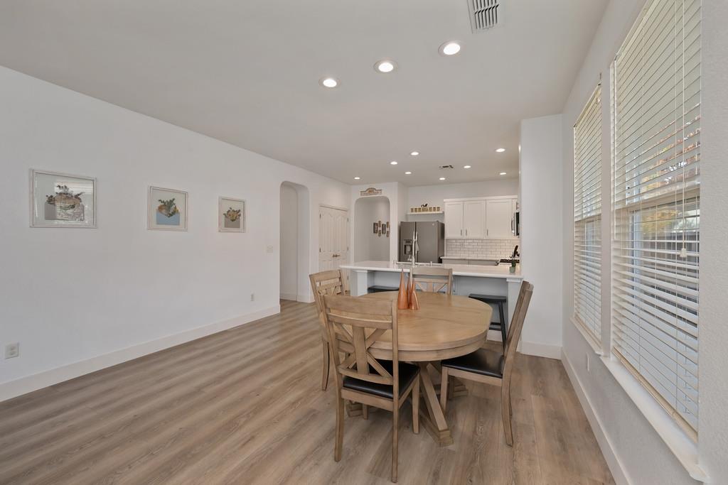 250 Pelican Bay Circle Sacramento, CA 95835 - Photo 29 of 71 a view of a dining room with furniture and wooden floor