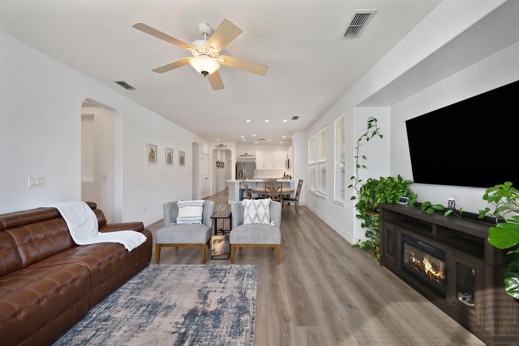 250 Pelican Bay Circle Sacramento, CA 95835 - Photo 34 of 71 a living room with furniture and a flat screen tv
