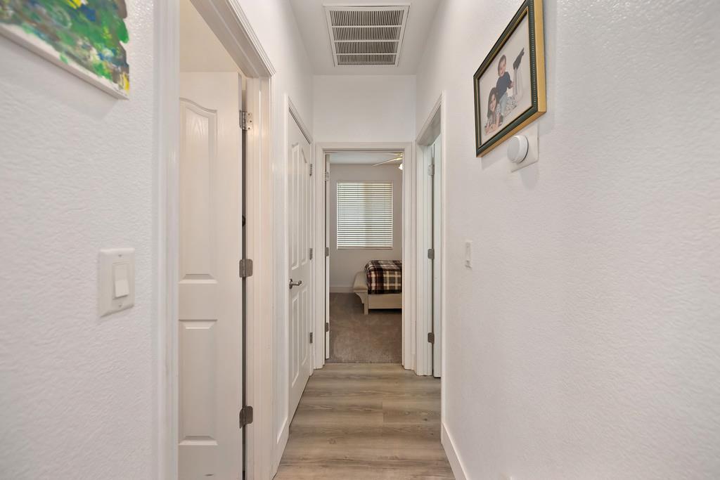 250 Pelican Bay Circle Sacramento, CA 95835 - Photo 43 of 71 a view of a hallway with wooden floor and entryway