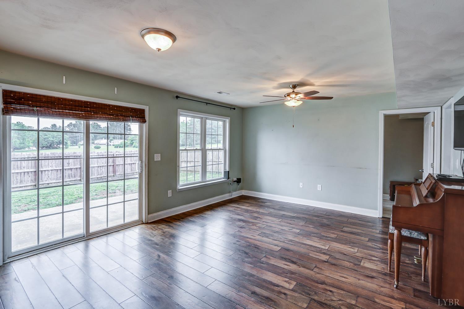 1057 Old Trail Road Forest, VA 24551 - Photo 17 of 49 wooden floor in an empty room with a window