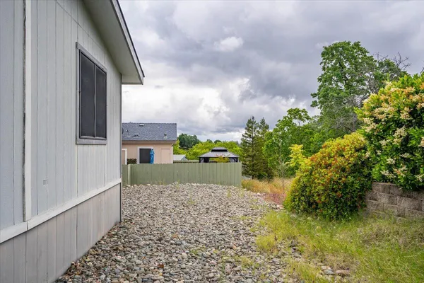 a view of front door and yard