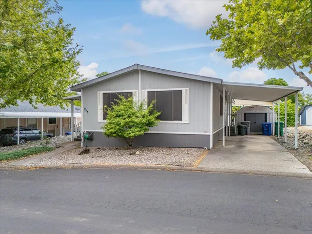 an aerial view of a house with swimming pool