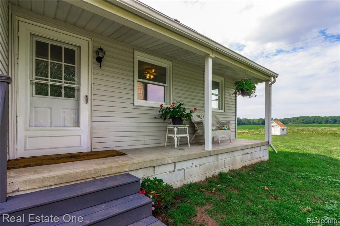 14484 Imlay City Road Capac, MI 48014 - Photo 33 of 39 2nd covered porch