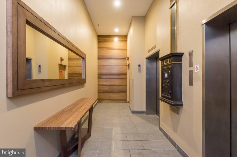 220 South 16th Street, Unit 902 Philadelphia, PA 19102 - Photo 4 of 16 a view of hallway with stairs